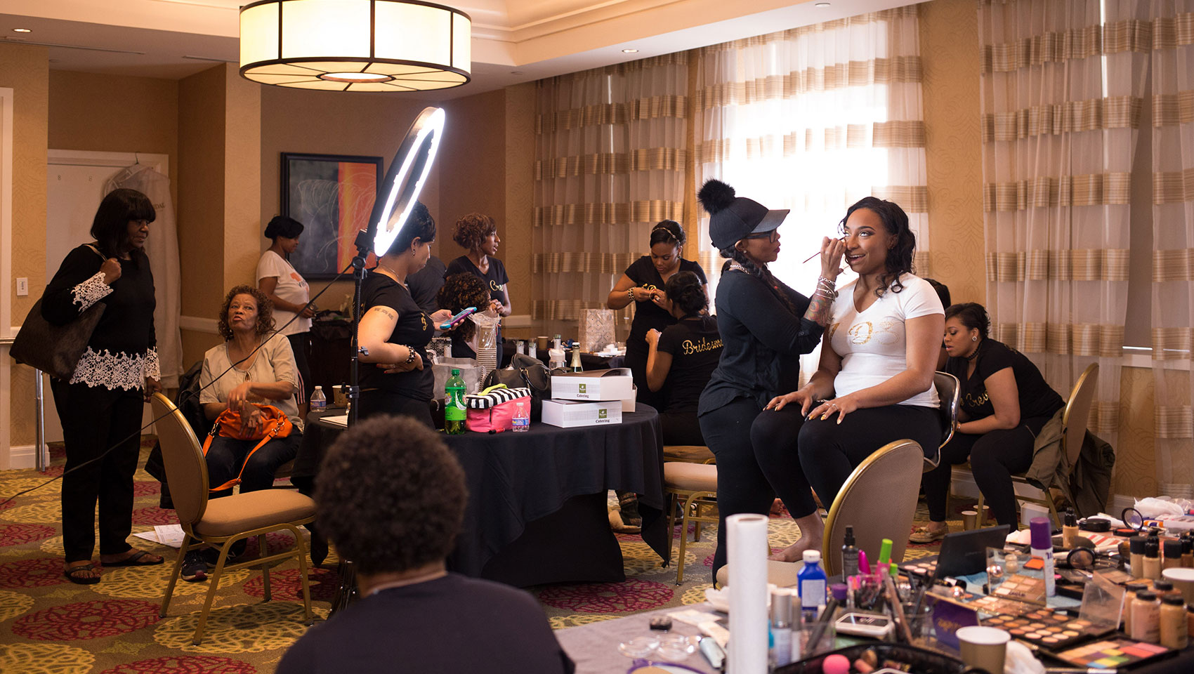 Jenel and Anthony's Monaco Baltimore wedding - Bride getting makeup done