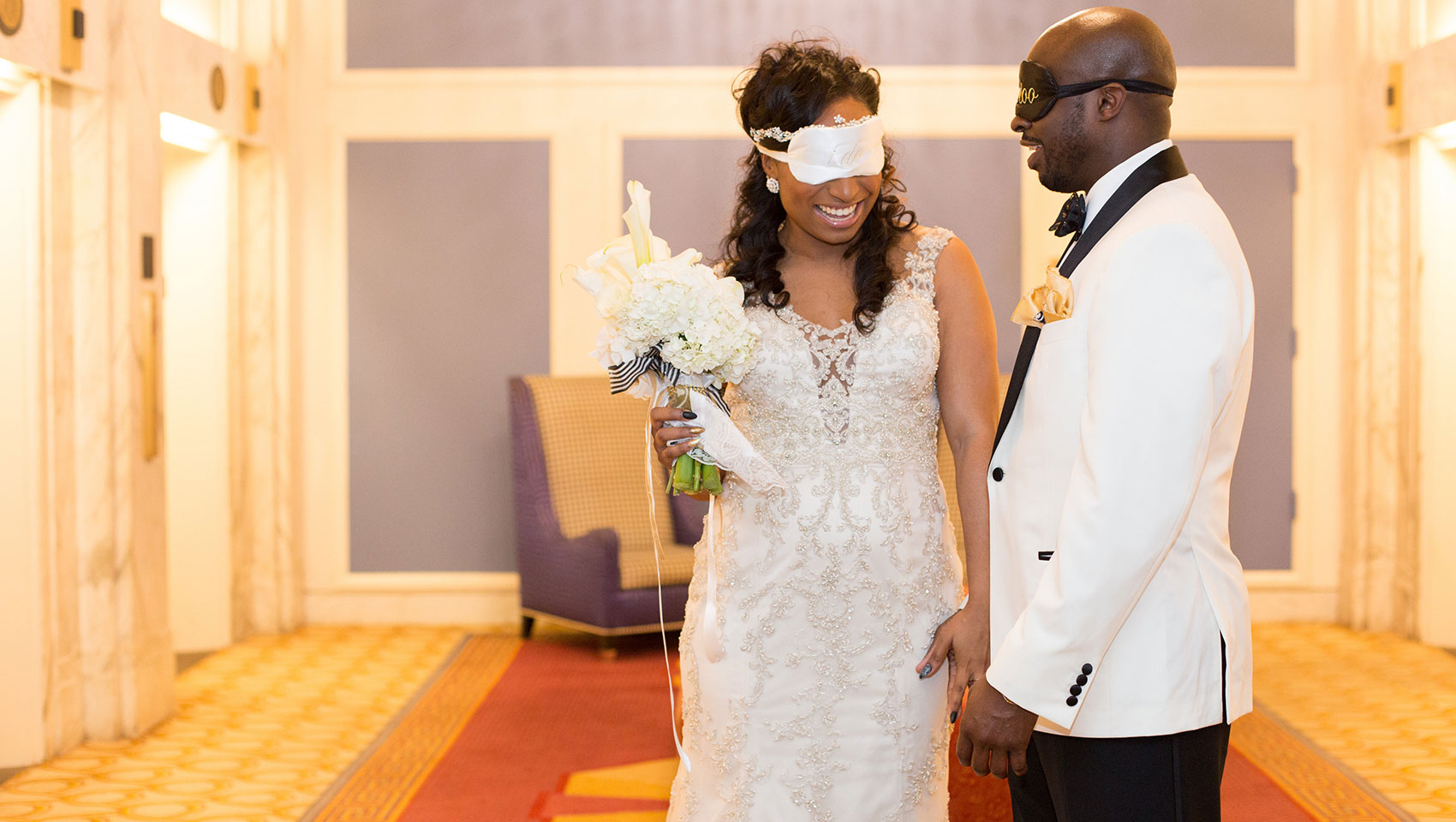 Jenel and Anthony's Monaco Baltimore wedding - Bride and Groom blindfolded touching for the first time