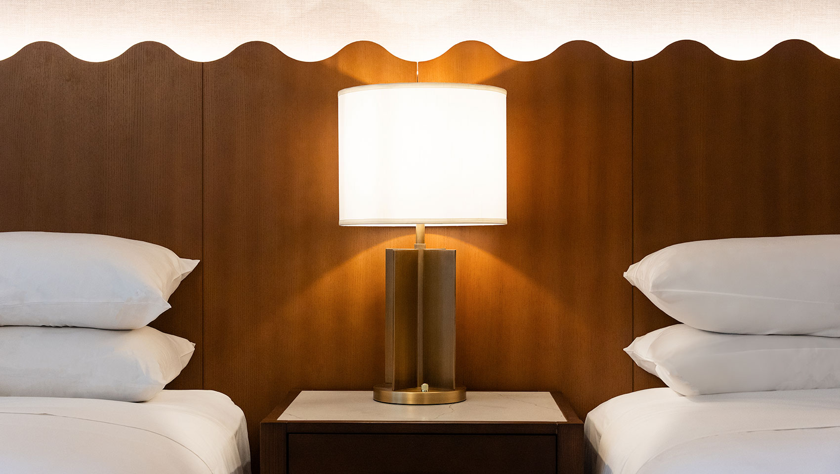 2 Queen beds close-up and shared side table