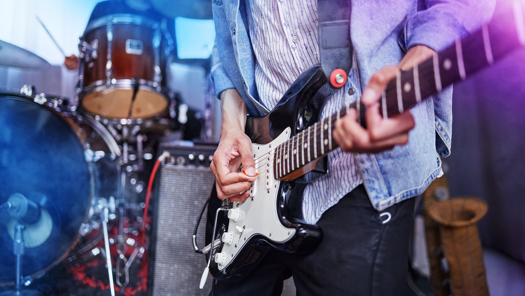 Person Playing Electric Guitar