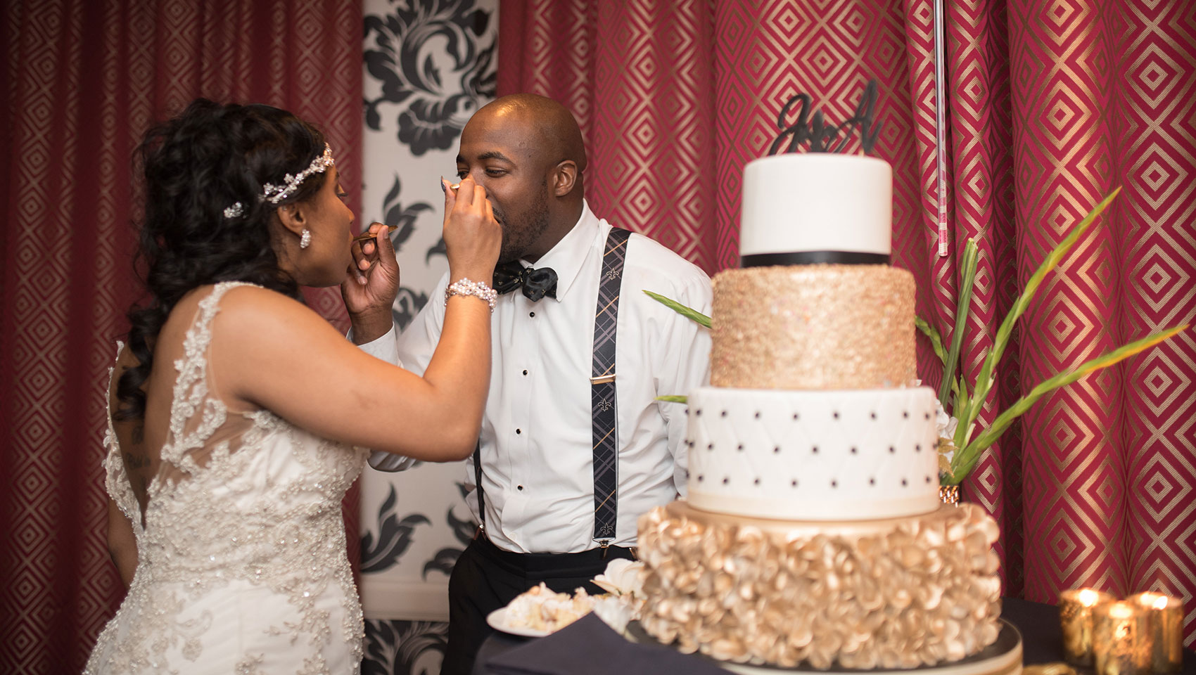 Jenel and Anthony's Monaco Baltimore wedding - Bride and Groom eating cake