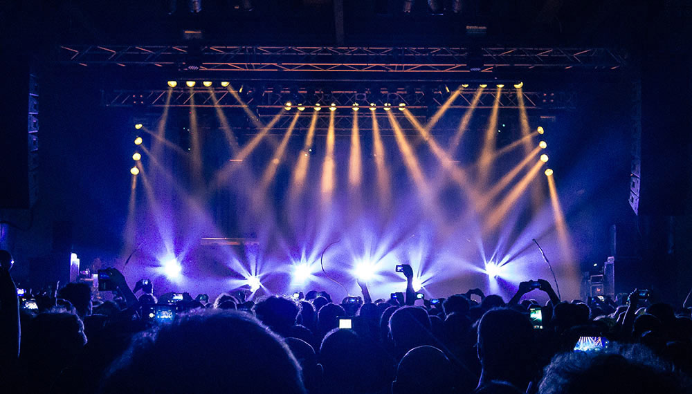 Fans in front of concert stage